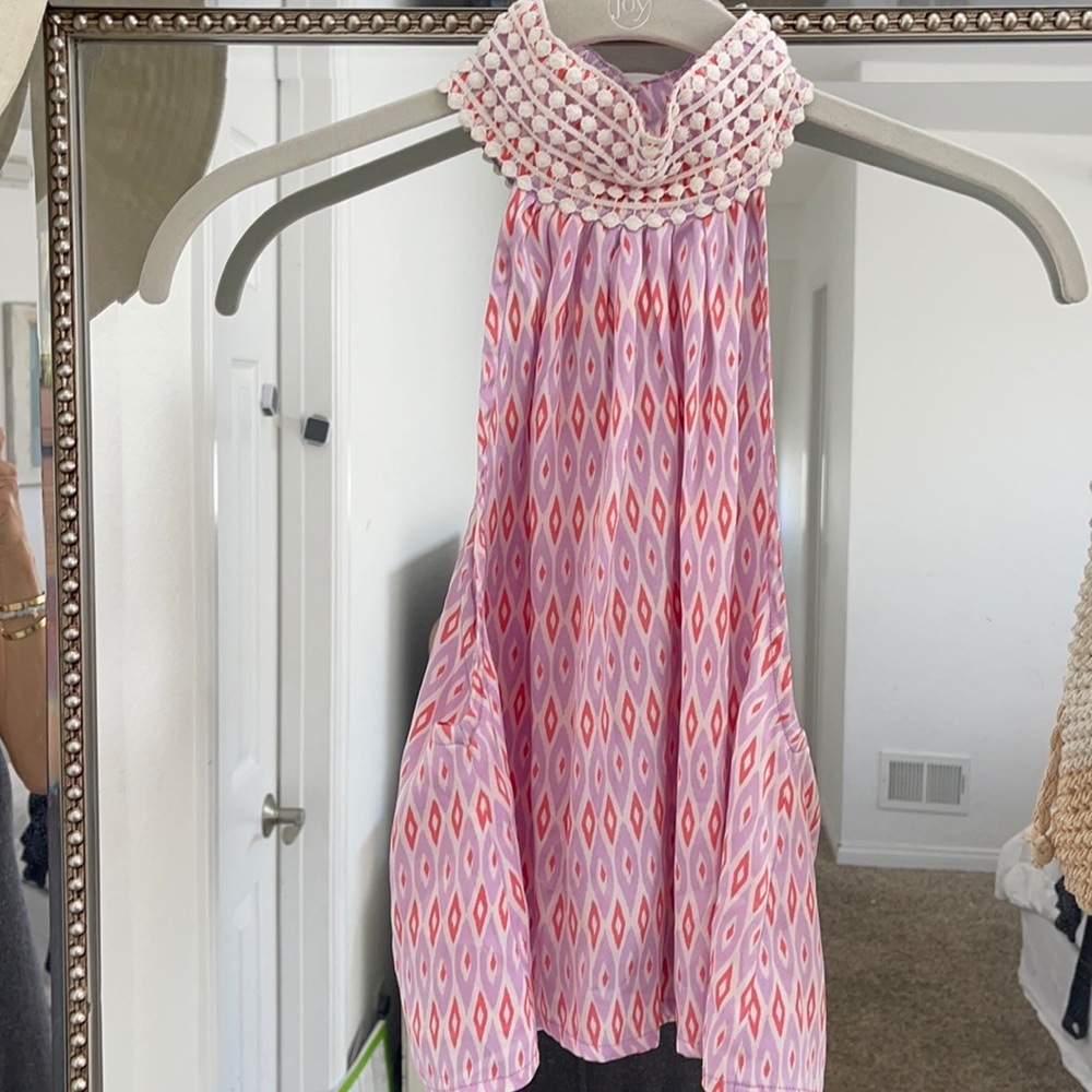 A set of a crop top and flowy long skirt.